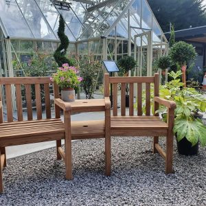 Teak Companion Seat on display at Carr Bank Garden Centre
