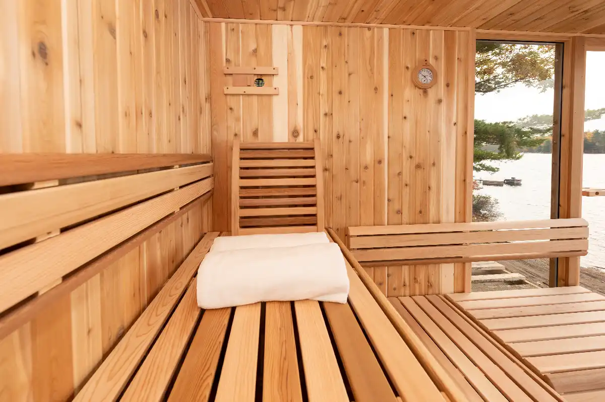 Third garden view of the Pure Cube modern outdoor sauna – available at Carr Bank Garden Centre. Pure Cube modern outdoor sauna third garden view – outdoor cube sauna from Carr Bank Garden Centre