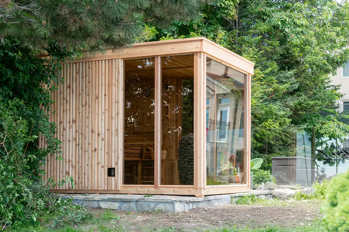The Pure Cube sauna with Red Cedar cladding on the exterior facade – at Carr Bank Garden Centre. Pure Cube modern outdoor sauna with Red Cedar cladding exterior – luxury sauna from Carr Bank Garden Centre
