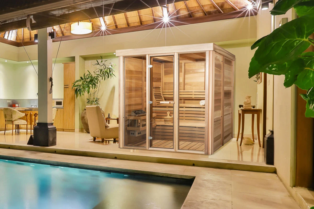 The Pure Cube Indoor Sauna in Red Cedar as a private home sauna installation – at Carr Bank Garden Centre. Pure Cube indoor sauna Red Cedar private home installation – luxury sauna from Carr Bank Garden Centre