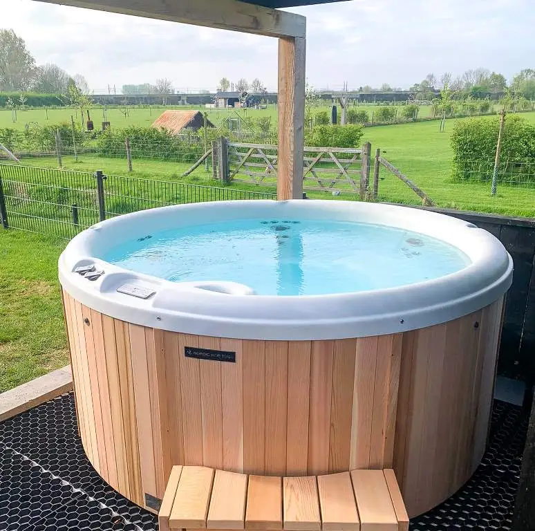 Red Cedar Nordic Spa Hot Tub exterior - outdoor hot tub from Carr Bank Garden Centre