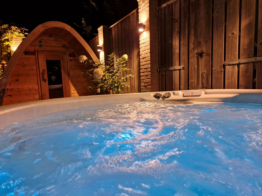 The Nordic Classic Series Hot Tub in an outdoor garden setting – available at Carr Bank Garden Centre. Nordic Classic Series Hot Tub outdoor – luxury cedar hot tub from Carr Bank Garden Centre Cumbria