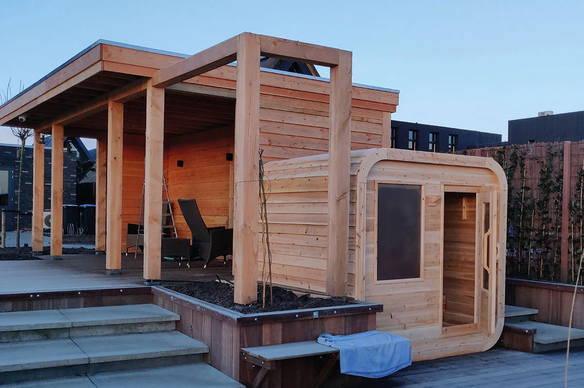 Exterior view of the Luna White Cedar Outdoor Sauna – available at Carr Bank Garden Centre. Luna White Cedar Outdoor Sauna exterior view – garden sauna from Carr Bank Garden Centre Cumbria