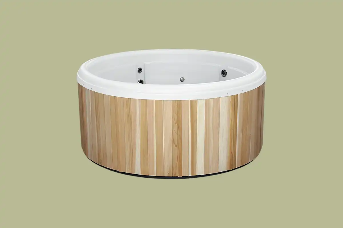 Side view of the Nordic Classic Series Cedar Hot Tub – at Carr Bank Garden Centre, Cumbria. Nordic Classic Series Cedar Hot Tub side view – luxury outdoor hot tub from Carr Bank Garden Centre