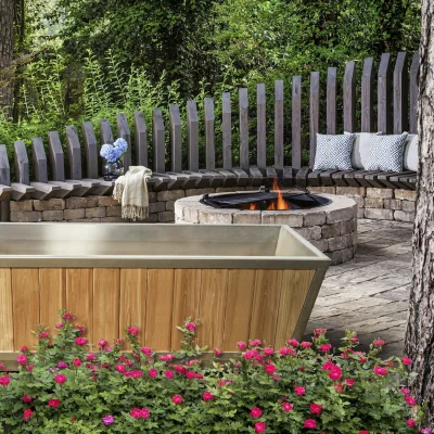 Glacier Plunge Tub Red Cedar in a garden setting – cold water therapy ice bath from Carr Bank Garden Centre