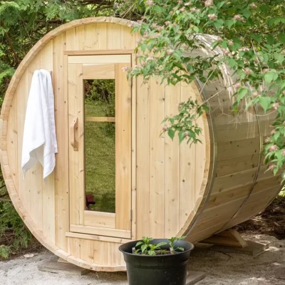 Cedar Barrel Sauna White Cedar in relaxation garden setting – outdoor sauna from Carr Bank Garden Centre