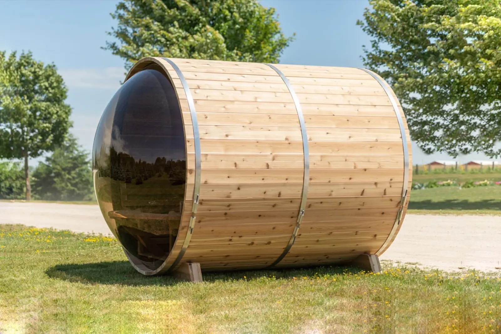 Side exterior view of the Panorama Cedar Barrel Sauna – available at Carr Bank Garden Centre, Cumbria. Panorama Cedar Barrel Sauna side exterior view – outdoor Red Cedar sauna from Carr Bank Garden Centre Cumbria