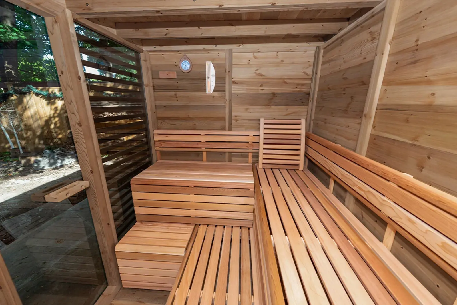Pure Cube Red Cedar Sauna interior with L-shape benches - luxury outdoor sauna