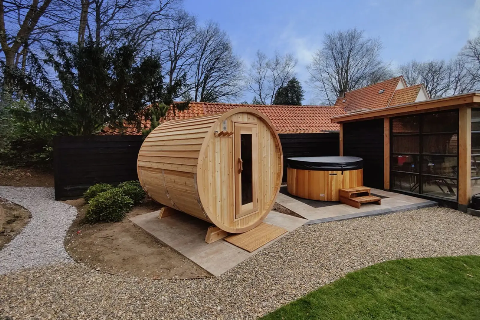 The Cedar Barrel Sauna paired with a Nordic spa for the ultimate outdoor wellness experience – at Carr Bank Garden Centre. Cedar Barrel Sauna Red Cedar paired with Nordic spa – outdoor wellness setup from Carr Bank Garden Centre