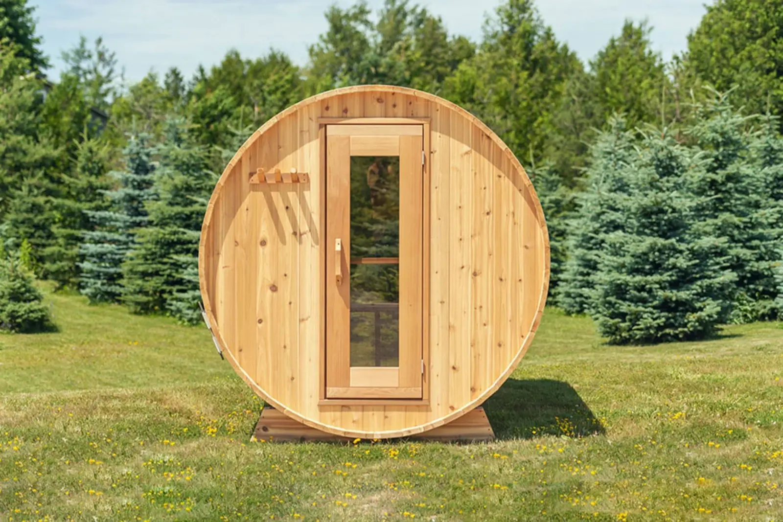 The Cedar Barrel Sauna in Red Cedar shown in a garden lifestyle setting – available at Carr Bank Garden Centre. Cedar Barrel Sauna Red Cedar in garden lifestyle setting – outdoor sauna from Carr Bank Garden Centre Cumbria